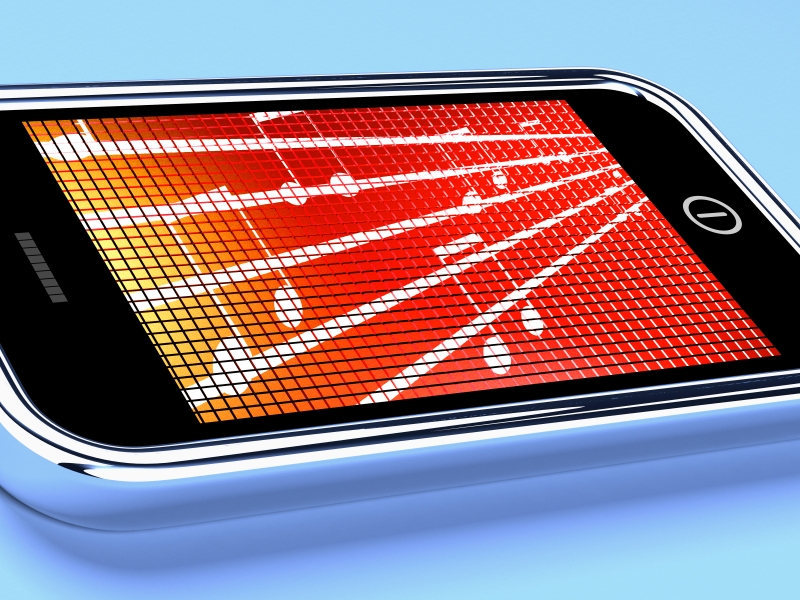 3418891-music-symbols-on-a-mobile-phone-shows-online-radio